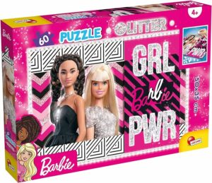 Enfant assemblant un puzzle Barbie 2 en 1 avec perles adhésives scintillantes.