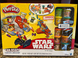 Play-Doh Can-Heads, pâte à modeler colorée et accessoires pour créer des visages amusants et personnalisés.